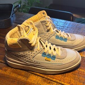Nike Beige Suede High-Top Sneakers with Yellow & Blue Accents